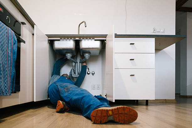Professional Emergency Plumber technician working in Webster, IN